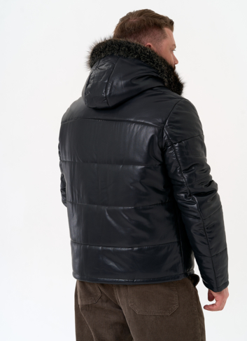 Пуховик из эко кожи с капюшоном из меха енота